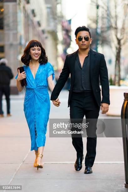 Constance Wu seen wearing Prabal Gurung with designer Prabal Gurung in Midtown on March 18, 2018 in New York City.
