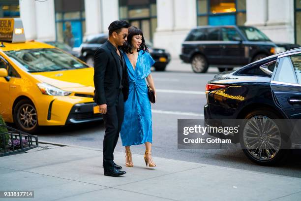 Constance Wu seen wearing Prabal Gurung with designer Prabal Gurung in Midtown on March 18, 2018 in New York City.