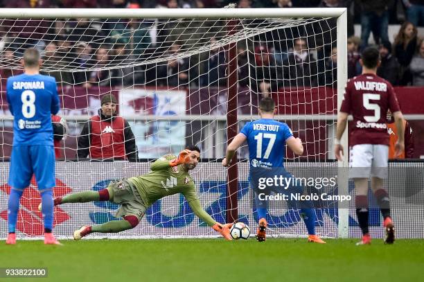 Salvatore Sirigu of Torino FC makes a save on Jordan Veretout of ACF Fiorentina attempt to score on penalty kick during the Serie A football match...
