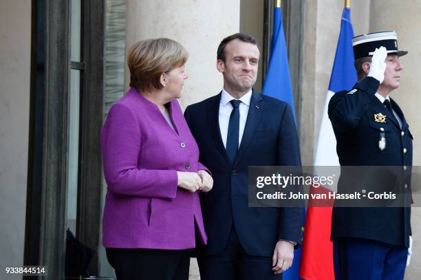 President Emmanuel Macron of France receives German Chancellor Angela Merkel at Elysee Palace on March 16, 2018 in Paris, France. The main issue of...