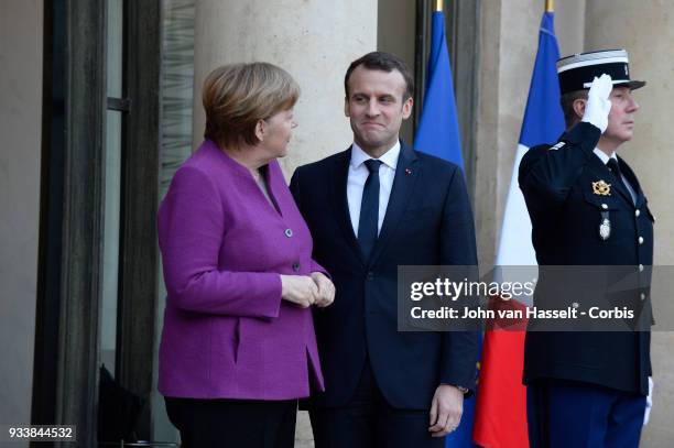 President Emmanuel Macron of France receives German Chancellor Angela Merkel at Elysee Palace on March 16, 2018 in Paris, France. The main issue of...