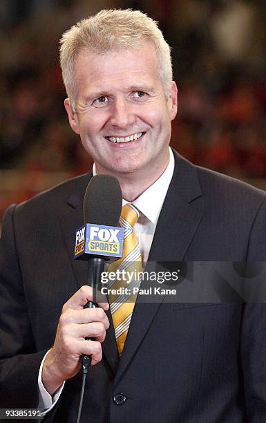 Commentator and former Australian basketball player Andrew Gaze presents on camera during the round eight NBL match between the Perth Wildcats and...