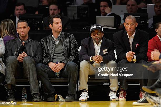 Baseball player Alex Rodriguez of the New York Yankees, director Spike Lee , and former basketball player Reggie Miller attend a game between the New...