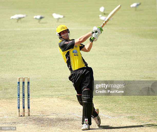 Mitchell Marsh of the Warriors hits out during the Ford Ranger Cup match between the Western Australian Warriors and the New South Wales Blues at...