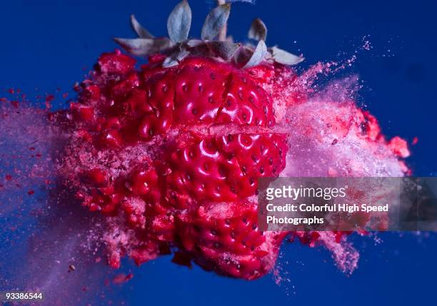 voyage to the planet of frozen strawberries - esplodere foto e immagini stock