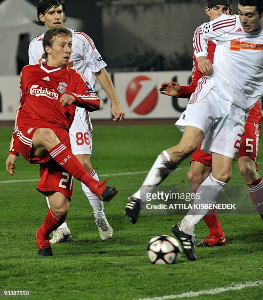 Liverpool's Lucas figths for the ball with Hungarian VSC Debrecen's Zoltan Szelesi at the Puskas stadium in Budapest on November 24, 2009 during...