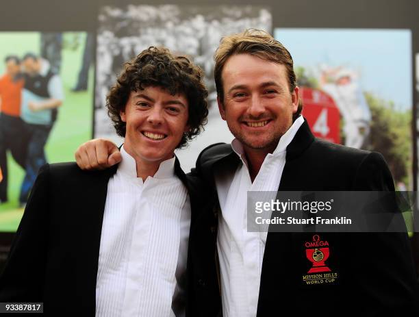 Rory McIlroy and Graeme McDowell of Northern Ireland during the opening ceremony at the Omega Mission Hills World Cup on the Olazabal course on...