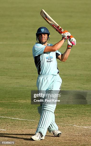 Moises Henriques of the Blues hits out during the Ford Ranger Cup match between the Western Australian Warriors and the New South Wales Blues at WACA...