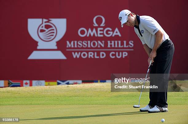 Richard Sterne of South Africa putts during the pro - am at the Omega Mission Hills World Cup on the Olazabal course on November 25, 2009 in...