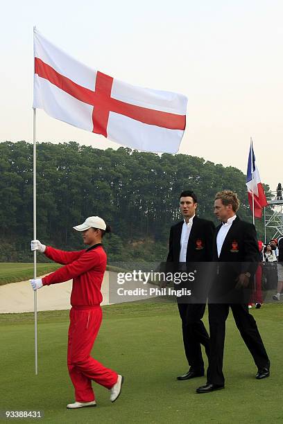 Ian Poulter and Ross Fisher of England during the Opening Ceremony of the Omega Mission Hills World Cup played over the Olazabal Course on November...