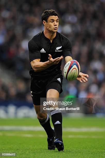 Dan Carter of New Zealand passes the ball during the Investec Challenge Series match between England and New Zealand at Twickenham on November 21,...