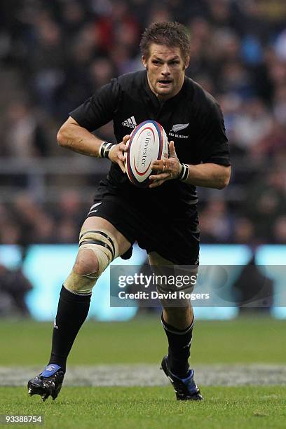 Richie McCaw of New Zealand runs with the ball during the Investec Challenge Series match between England and New Zealand at Twickenham on November...