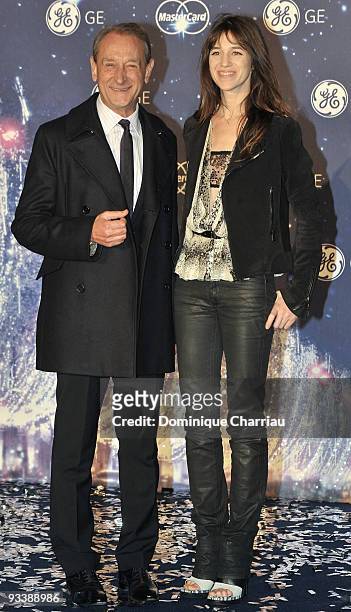 Mayor of Paris Bertrand Delanoe and french actress Charlotte Gainsbourg attend the switching on of christmas lights and illuminations on the Champs...