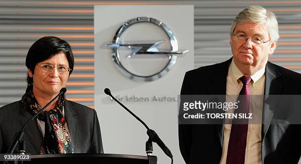 General Motors Europe interim chairman Nick Reilly and Thuringia's State Premier Christine Lieberknecht address a press conference at Opel's plant in...