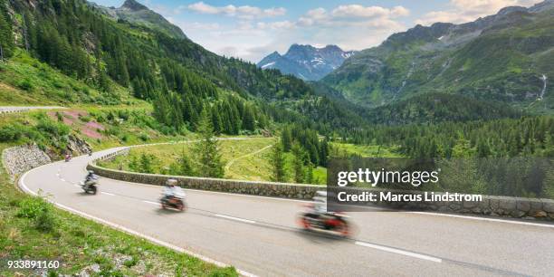 through switzerland on motorcycle - group of bikers stock pictures, royalty-free photos & images