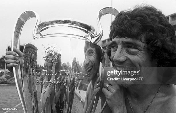 Kevin Keegan of Liverpool poses for a photograph with the European Cup before flying home on May 26, 1977 in Rome, Italy. His black eye clearly...