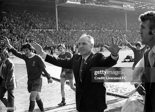 Liverpool manager Bill Shankly proudly acknowledges the supporters after defeat in the FA Cup Final between Liverpool and Arsenal held on May 8, 1971...