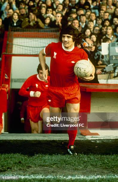 Kevin Keegan of Liverpool runs out of the player's tunnel with the ball at the start of an unidentifeid match held at Anfield, in Liverpool, England.