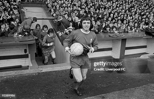 Kevin Keegan of Liverpool runs out of the player's tunnel with the ball prior to the Football League Division One match between Liverpool and...
