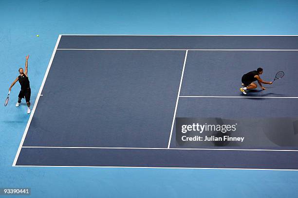 Lukasz Kubot of Poland plays with Oliver Marach of Austria during the men's doubles first round match against Max Mirnyi of Belarus and Andy Ram of...