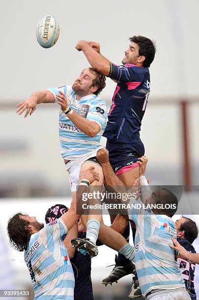Stade Francais's lock Pierre Vigouroux vies with Racing Metro's flanker Remi Vaquin in a line-out during French Top 14 rugby union match Racing Metro...