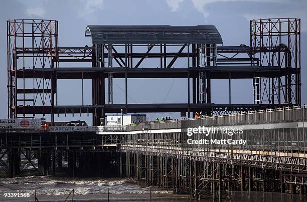 Waves break beneath the new steel framework of Weston-Super-Mare's Grand Pier on November 25, 2009 in Weston-Super-Mare, England. Although the recent...