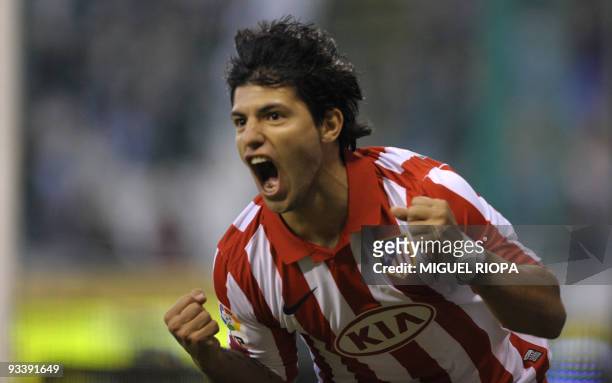 Atletico Madrid's Argentinian forward Sergio Aguero celebrates after scoring against Deportivo Coruna during their Spanish first league football...