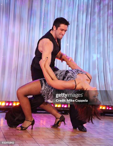 Singer-actress Mya ) and partner Dmitry Chaplin dance on ABC's "Good Morning America" at ABC Studios on November 25, 2009 in New York City.