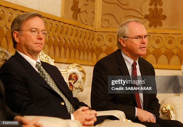 Ambassador to Iraq Christopher Hill readies to speak as Google chief executive Eric Schmidt listens on following a press conference at the...