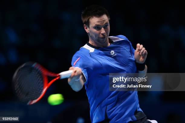 Robin Soderling of Sweden returns the ball during the men's singles first round match against Novak Djokovic of Serbia during the Barclays ATP World...