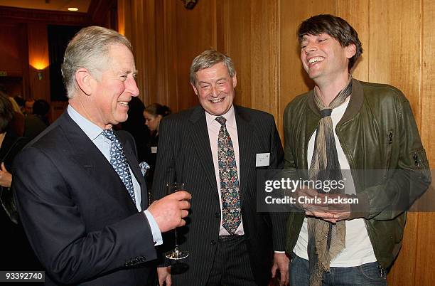 Prince Charles, Prince of Wales meets musician and journalist Alex James as they attend the BBC Radio 4 Food and Farming Awards 2009 at Broadcasting...