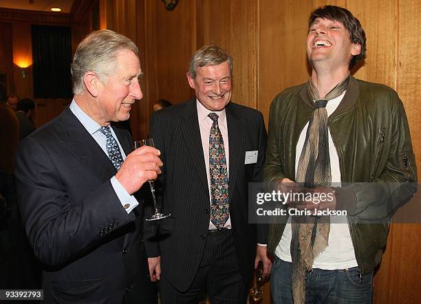 Prince Charles, Prince of Wales meets musician and journalist Alex James as they attend the BBC Radio 4 Food and Farming Awards 2009 at Broadcasting...