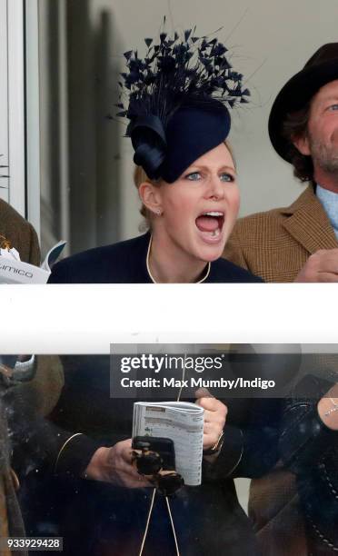 Zara Phillips watches the racing as she attends day 4 'Gold Cup Day' of the Cheltenham Festival at Cheltenham Racecourse on March 16, 2018 in...