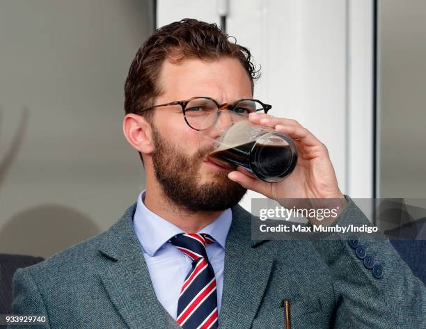 Jamie Dornan attends day 4 'Gold Cup Day' of the Cheltenham Festival at Cheltenham Racecourse on March 16, 2018 in Cheltenham, England.