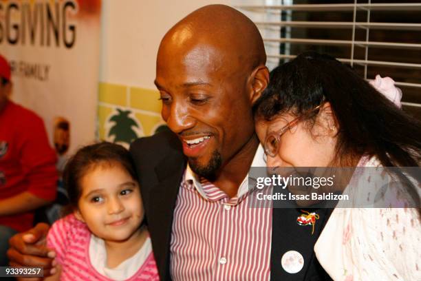 Alonzo Mourning of the Miami Heat participates in the Alonzo Mourning Charities' "33 Thanksgivings" on November 24, 2009 at the Ronald McDonald House...