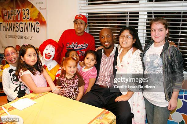 Alonzo Mourning of the Miami Heat participates in the Alonzo Mourning Charities' "33 Thanksgivings" on November 24, 2009 at the Ronald McDonald House...