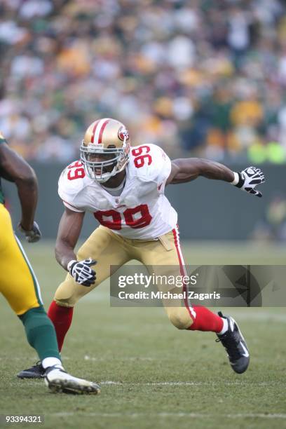 Manny Lawson of the San Francisco 49ers rushes during the NFL game against the Green Bay Packers at Lambeau Field on November 22, 2009 in Green Bay,...