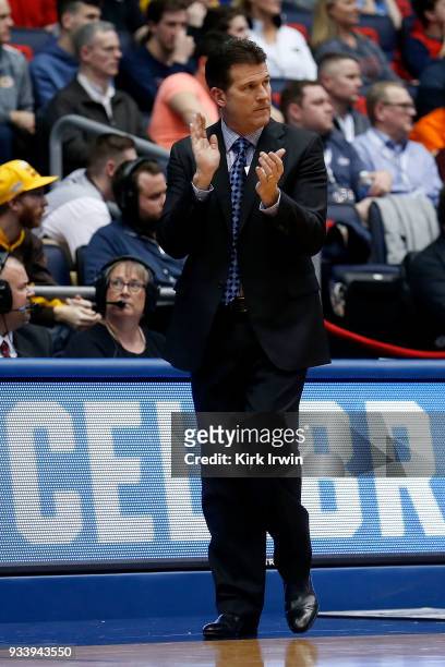 Head coach Steve Alford of the UCLA Bruins cheers on his players during the game against the St. Bonaventure Bonnies at UD Arena on March 13, 2018 in...