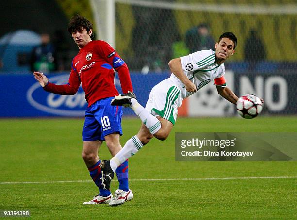 Alan Dzagoev of CSKA Moscow battles for the ball with Josue of VfL Wolfsburg during the UEFA Champions League group B match between CSKA Moscow and...