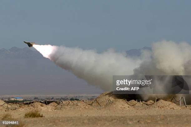 Hawk surface-to-air missile is launched during military exercises in Isfahan province, some 300 kms south of the capital Tehran, on November 25,...