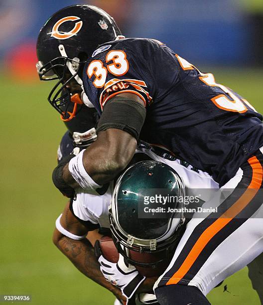 Charles Tillman of the Chicago Bears tackles DeSean Jackosn of the Philadelphia Eagles at Soldier Field on November 22, 2009 in Chicago, Illinois....