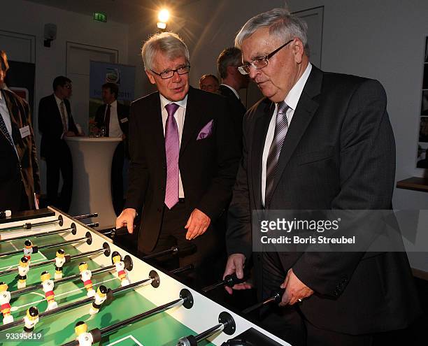 Reinhard Rauball , president of the German Football League and Theo Zwanziger , president of the German Football Association play kicker during the...