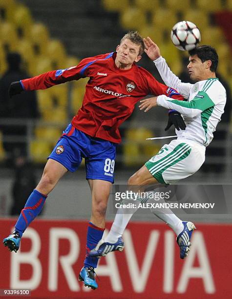 Ricardo Costa of Wolfsburg fights for the ball with Tomas Necid of CSKA Moscow, in Moscow on November 25, 2009 during the UEFA Champions League group...