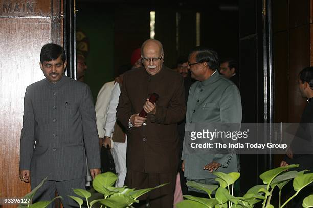 Opposition leader L.K Advani with Syed Shahnawaz Hussain on Tuesday, November 24, 2009.