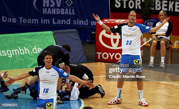 Pascal Hens of Hamburg reacts during the Bundesliga match between HSV Hamburg and TSV Dormagen at the Color Line Arena on November 25, 2009 in...