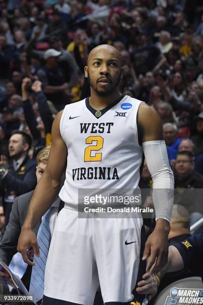 Jevon Carter of the West Virginia Mountaineers looks on after making a 4-point play against the Marshall Thundering Herd in the second half during...