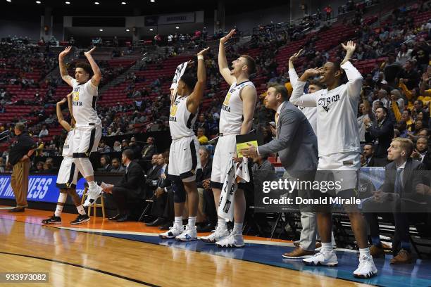 The West Virginia Mountaineers bench celebrate at the end of the second half against the Marshall Thundering Herd during the second round of the 2018...