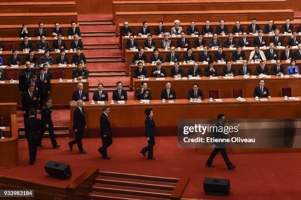 Newly elected Vice Premier Han Zheng followed by Vice Premier Sun Chunlan, Hu Chunhua and Liu He, State councilors Wei Fenghe, Wang Yong, Wang Yi,...