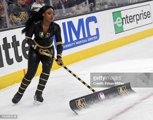 Member of the Knights Crew cleans the ice during the Vegas Golden Knights' game against the Calgary Flames at T-Mobile Arena on March 18, 2018 in Las...