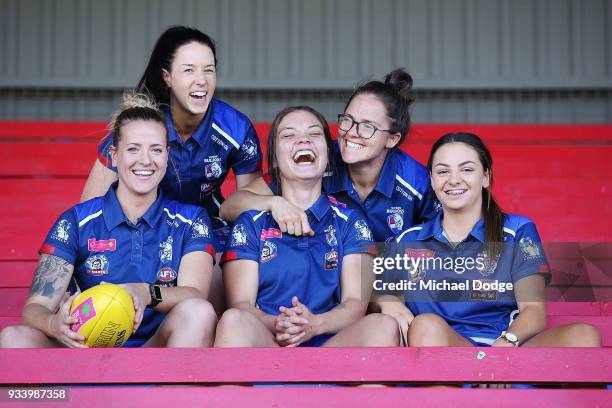 Hannah Scott, Brooke Lochland, Ellie Blackburn, Emma Kearney, Monique Conti pose during a Western Bulldogs AFLW media opportunity at Victoria...